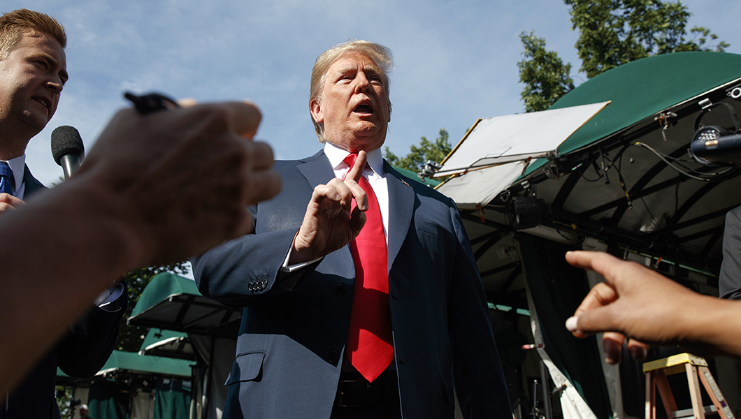 Trump clears up immigration bill confusion, pledges to back both GOP bills