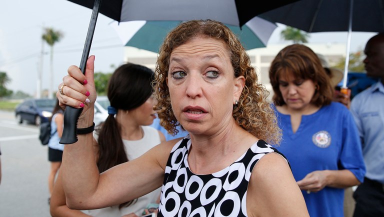 Congresswoman Debbie Wasserman Schultz walks across the street after she speaks during a news conference in front of the Homestead Temporary Shelter for Unaccompanied Children.