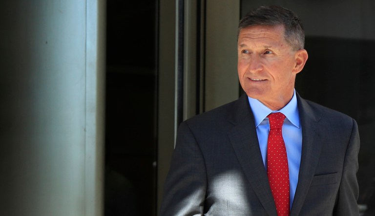 Former Trump national security adviser Michael Flynn leaves federal courthouse following a status hearing. 