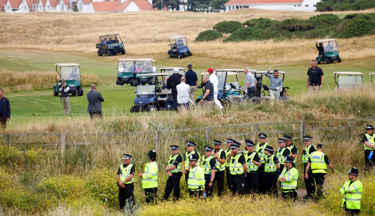 President Trump plays golf under tight security at Turnberry golf club in Scotland on July 14, 2018.