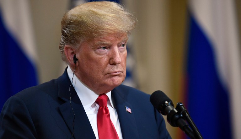 U.S. President Donald Trump listens during a join press conference with Russian President Vladimir Putin at the Presidential Palace in Helsinki, Finland, Monday, July 16, 2018.