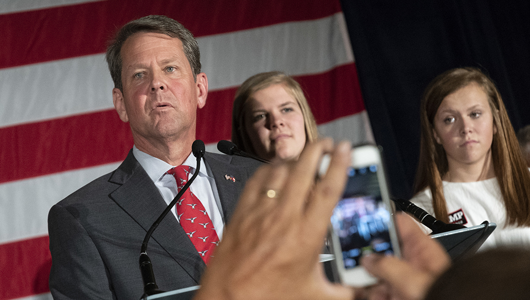 Kemp presents united front with Walker despite scandals