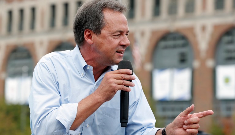 Montana Gov. Steve Bullock speaks at the Des Moines Register Soapbox during a visit to the Iowa State Fair, Thursday, Aug. 16, 2018, in Des Moines, Iowa.