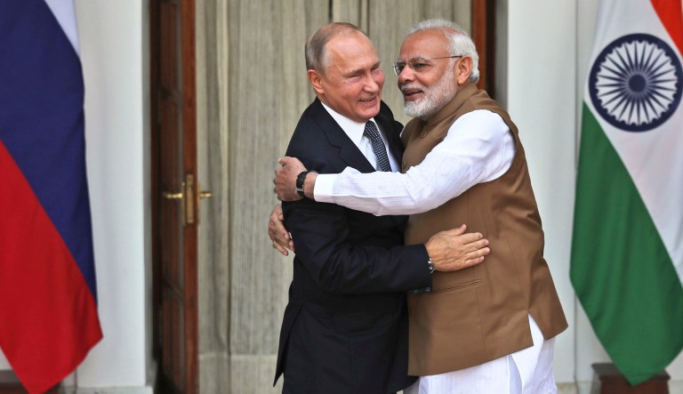 Indian Prime Minister Narendra Modi, right, hugs Russian President Vladimir Putin before their meeting in New Delhi, India, Friday, Oct. 5, 2018. Putin arrived in India on Thursday for a two-day visit during which India is expected to sign a $5 billion deal to buy Russian S-400 air defense systems despite a new U.S. law ordering sanctions on any country trading with Russia's defense and intelligence sectors.