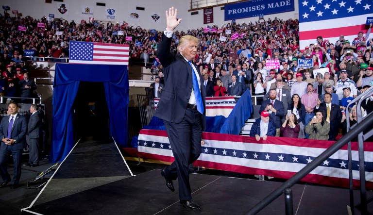 President Trump takes the stage at a rally at Alumni Coliseum in Richmond, Ky.
