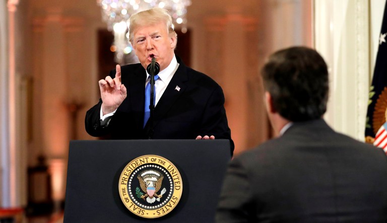 President Trump speaks with CNN White House correspondent Jim Acosta during a news conference in the East Room of the White House in D.C.
