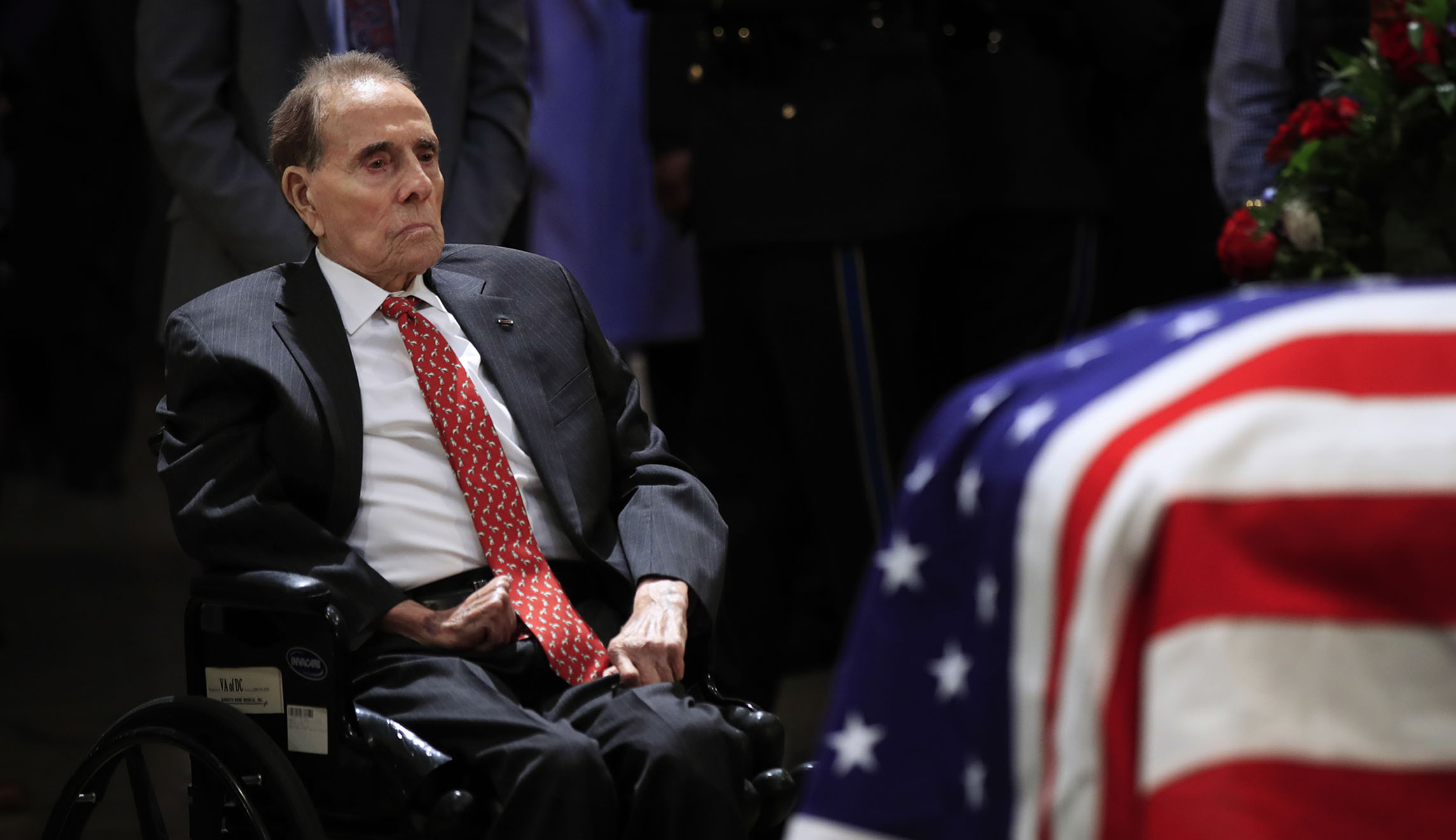 The touching backstory to Bob Dole’s salute to George H.W. Bush