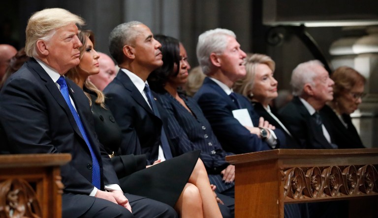 President Trump and first lady Melania Trump join the other living presidents and their wives, listening as former President George W. Bush speaks during a state funeral at the National Cathedral, Wednesday, Dec. 5, 2018, in Washington, for former President George H.W. Bush.