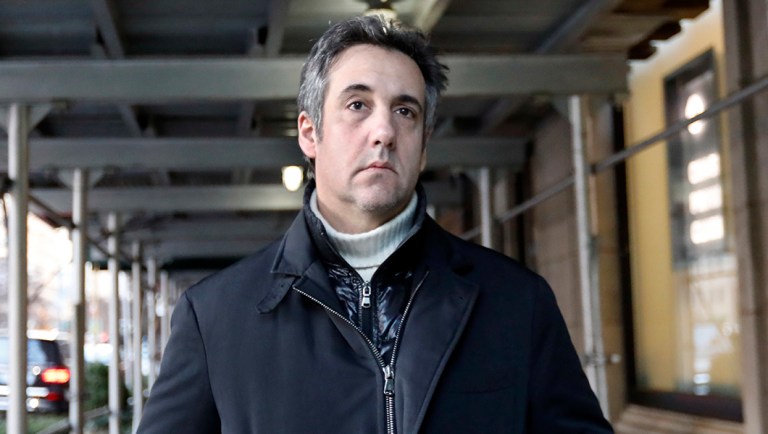 Michael Cohen, former lawyer to President Trump, leaves his apartment building on New York's Park Avenue.