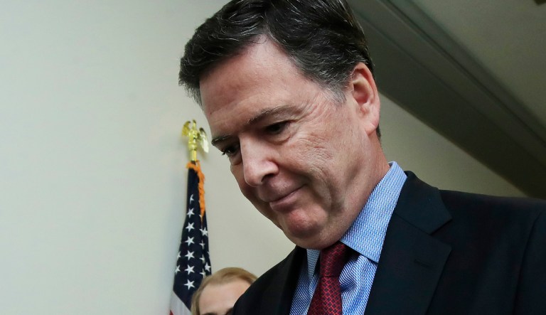 Former FBI Director James Comey speaks to reporters after testifying under subpoena behind closed doors before the House Judiciary and Oversight Committee on Capitol Hill in Washington, Friday, Dec. 7, 2018.