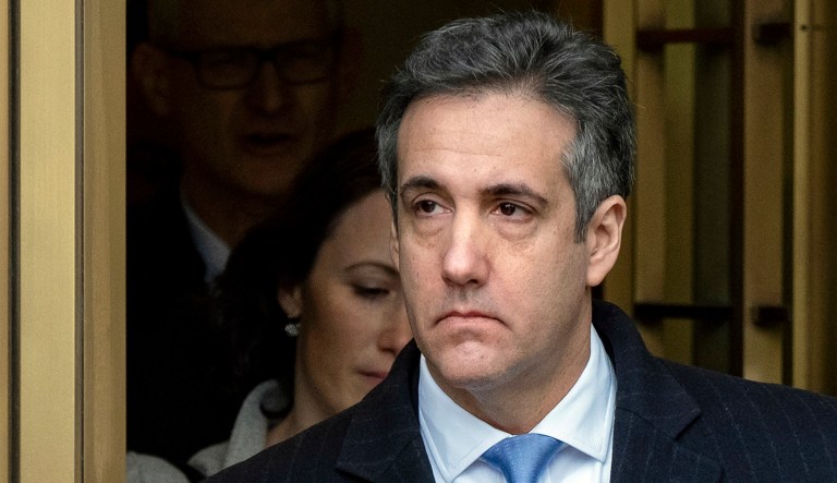Michael Cohen, President Donald Trump's former lawyer, leaves federal court after his sentencing in New York, Wednesday, Dec. 12, 2018. 