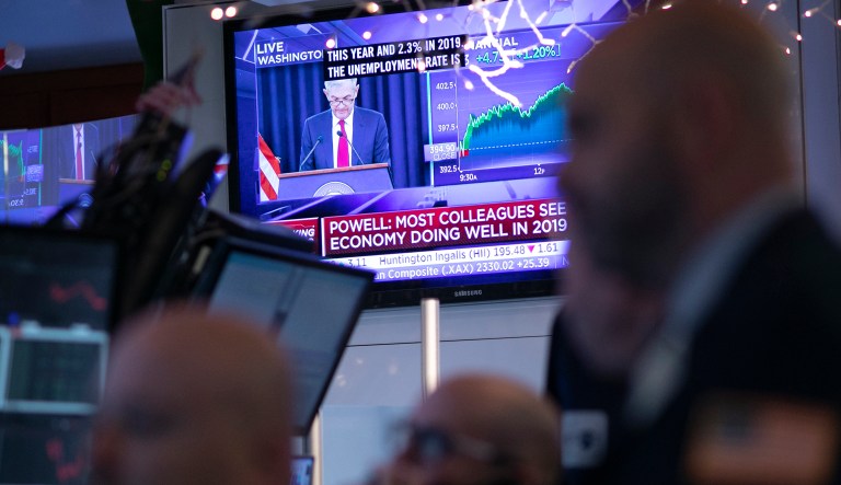 The Fed made the right call with rate hikes Traders at the New York Stock Exchange listen as Federal Reserve Chairman Jerome Powell is seen on a video screen giving a news conference from Washington after the Fed announced a rate increase, Wednesday, Dec. 19, 2018.