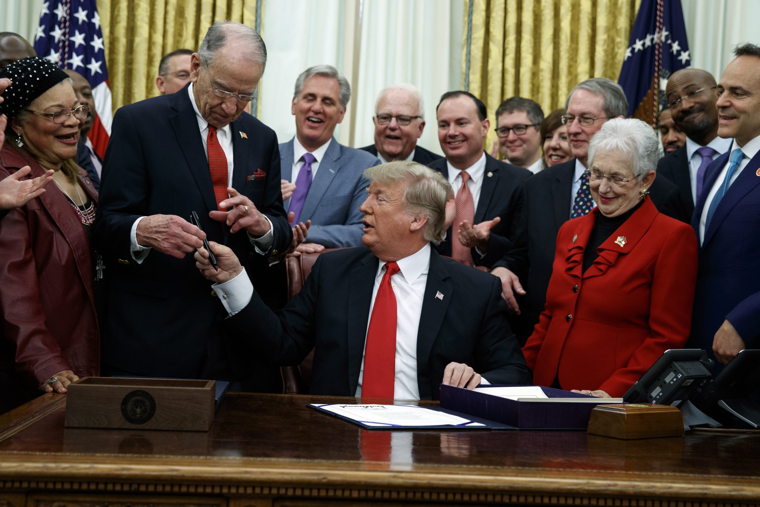 Bipartisanship blossoms during shutdown fight: Trump signs First Step Act