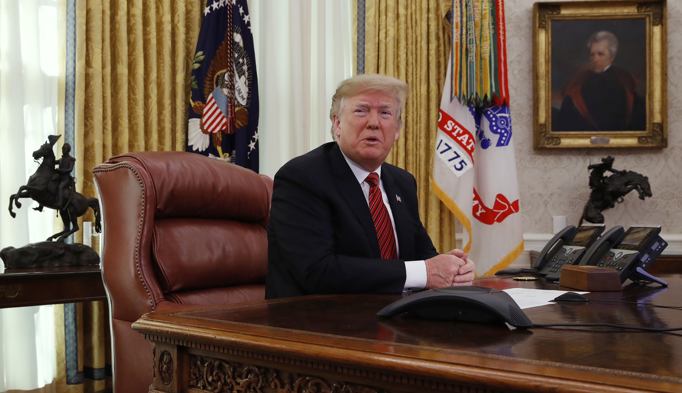 Journalists and White House spar over whether Trump is in the Oval Office on New Year’s Eve
