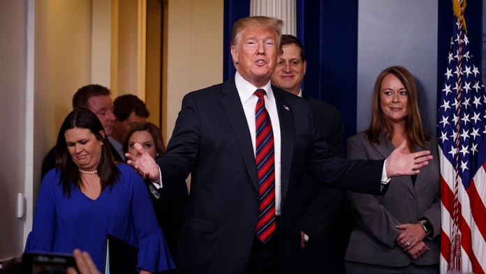 President Trump arrives for a surprise appearance to speak to reporters about border security.