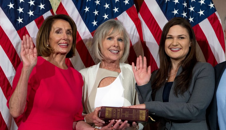 House Speaker Nancy Pelosi of Calif., administers the House oath of office to Rep. Abby Finkenauer, D-Iowa, during a ceremonial swearing-in on Capitol Hill in Washington, Thursday, Jan. 3, 2019, during the opening session of the 116th Congress. 
