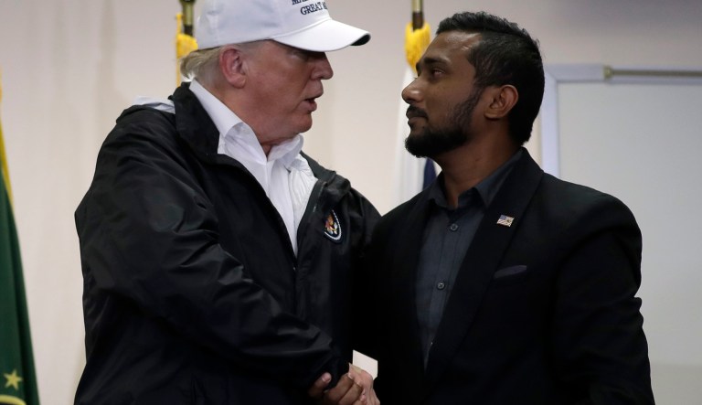 President Donald Trump recognizes shakes hands with Reggie Singh, brother of slain California police officer Cpl. Ronil Singh, at a roundtable on immigration and border security at U.S. Border Patrol McAllen Station, during a visit to the southern border, Thursday, Jan. 10, 2019, in McAllen, Texas.