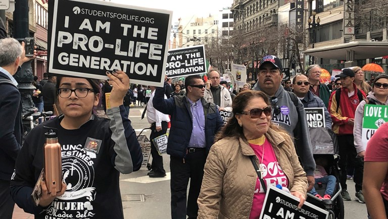 Thousands of abortion opponents march in the 15th annual Walk for Life across downtown San Francisco.