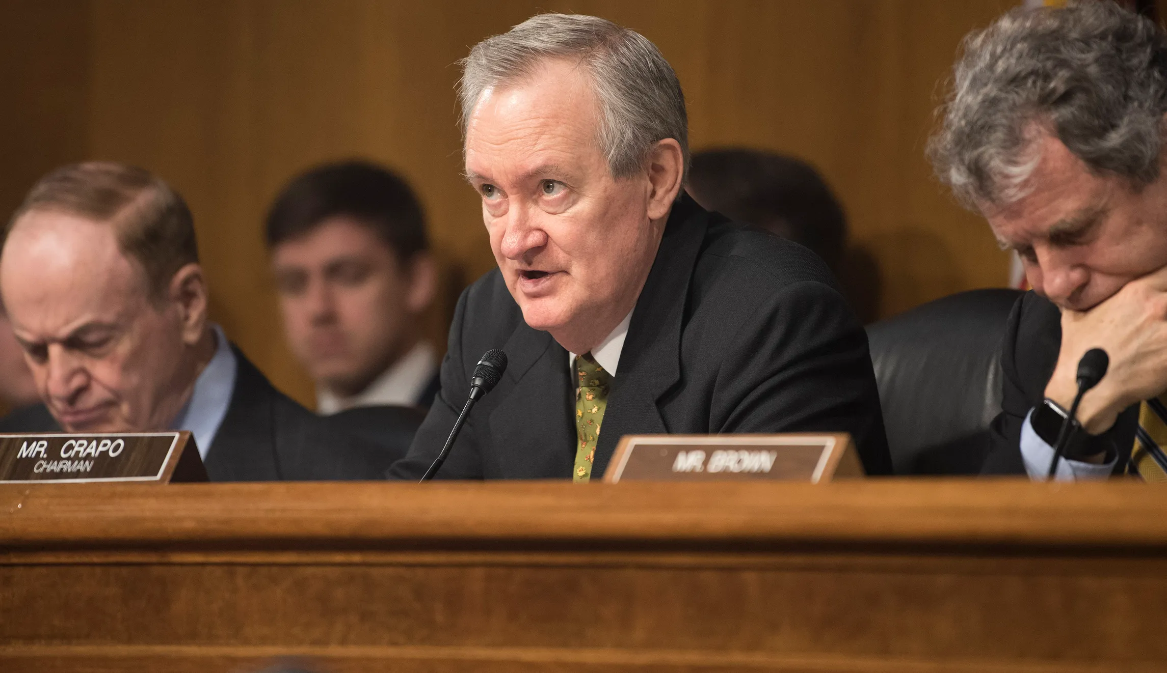 Mike Crapo warns big banks against caving to progressives on guns