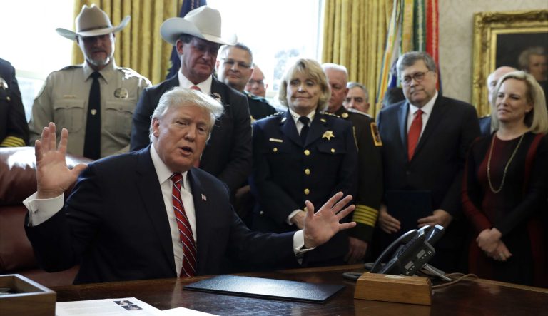 President Donald Trump speaks about border security in the Oval Office of the White House, Friday, March 15, 2019, in Washington. Trump issued the first veto of his presidency, overruling Congress to protect his emergency declaration for border wall funding. 
