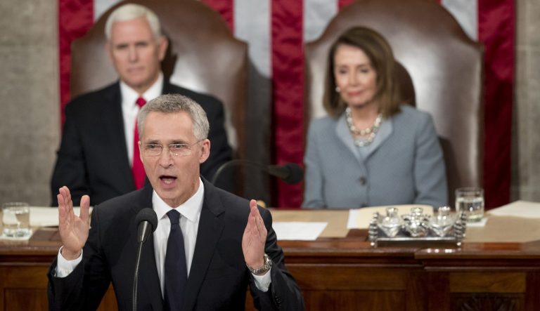 NATO Secretary General Jens Stoltenberg, accompanied by Vice President Mike Pence, left and House Speaker Nancy Pelosi of Calif., right, address a Joint Meeting of Congress on Capitol Hill in Washington, Wednesday, April 3, 2019, having been invited by the bipartisan leadership of the House of Representatives and the Senate. 
