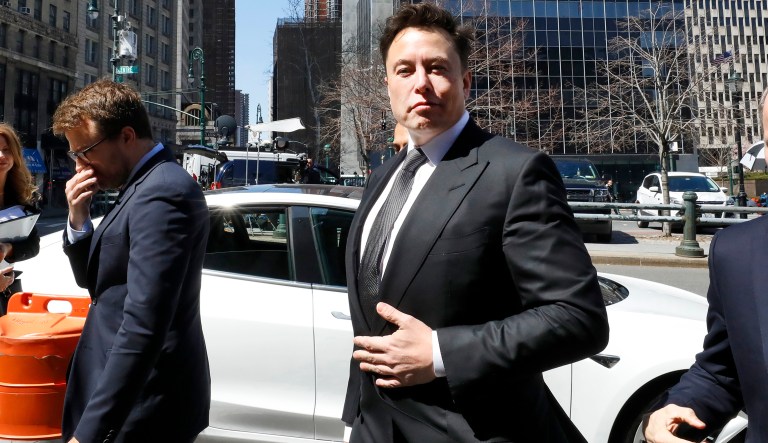 Tesla CEO Elon Musk arrives in a Tesla at Manhattan Federal Court, in New York, Thursday, April 4, 2019.