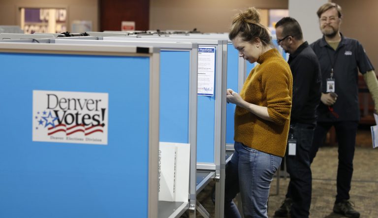 Voters fill out their ballots at the Denver Elections Division Tuesday, May 7, 2019, in Denver. Voters could make Denver the first U.S. city to decriminalize the use of psilocybin, the psychoactive substance in "magic mushrooms" if the measure passes.