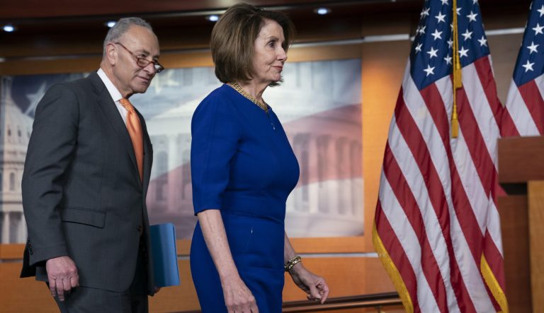 Speaker of the House Nancy Pelosi, D-Calif., and Senate Minority Leader Chuck Schumer, D-N.Y., left, and other congressional leaders, arrive to tell reporters about their failed meeting with President Donald Trump at the White House on infrastructure, at the Capitol in Washington, Wednesday, May 22, 2019.  