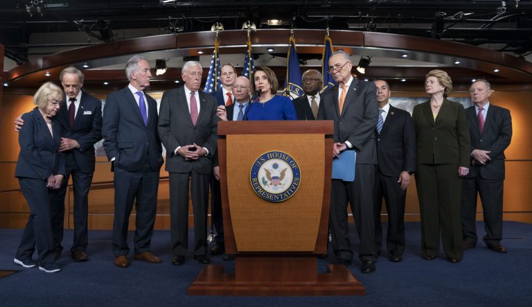 Speaker of the House Nancy Pelosi, D-Calif., center, joined by Senate Minority Leader Chuck Schumer, D-N.Y., right, and other congressional leaders, react to a failed meeting with President Donald Trump at the White House on infrastructure, at the Capitol in Washington, Wednesday, May 22, 2019.