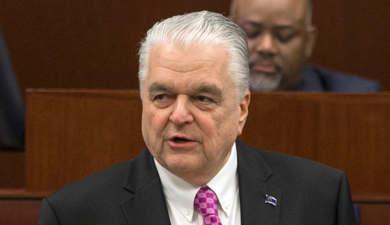 Nevada Gov. Steve Sisolak delivers a speech.