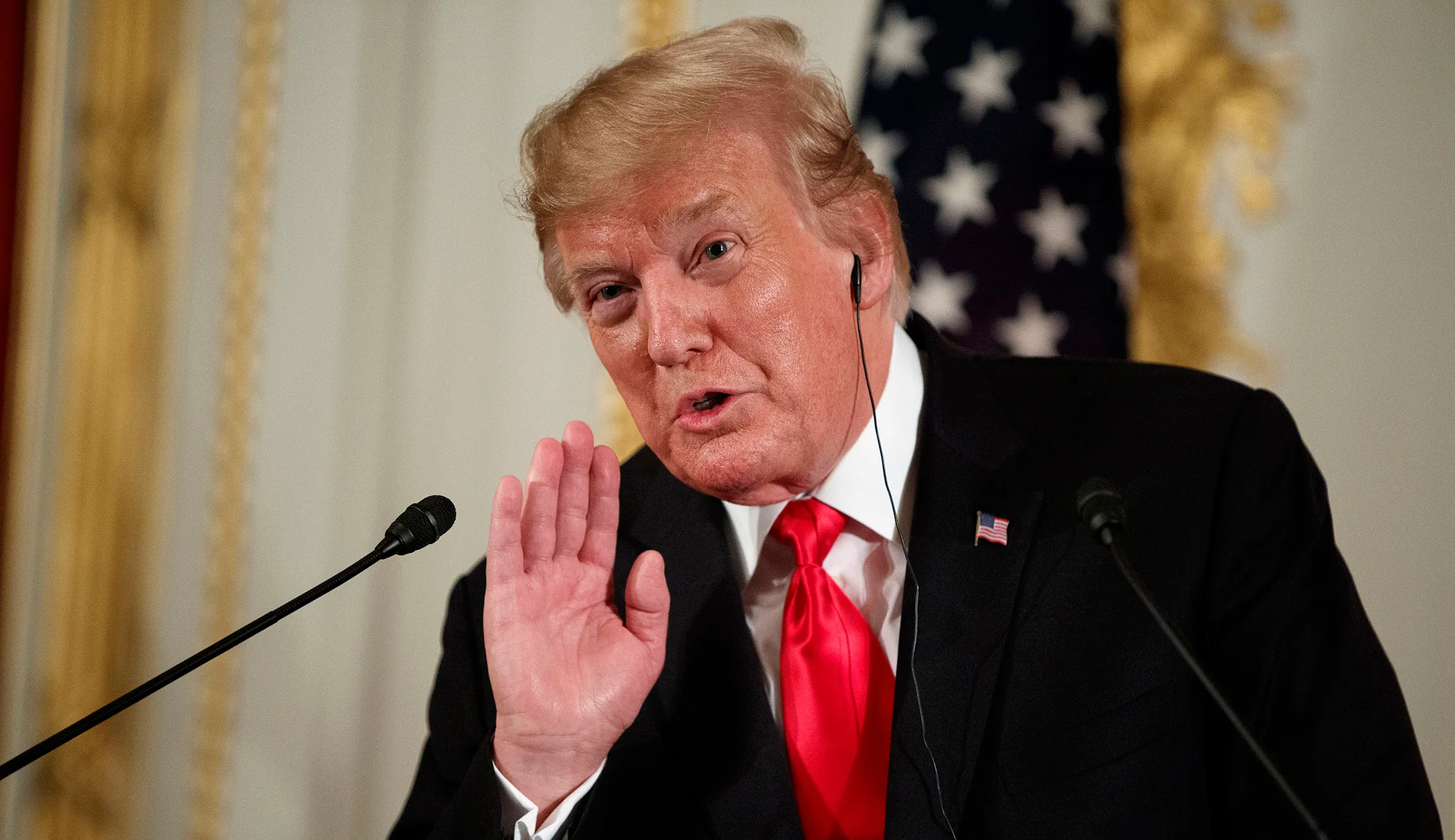 Trump says he is not looking for regime change in Iran