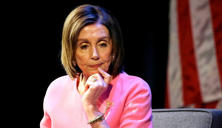 Speaker of the House Nancy Pelosi, D-Calif., listens to a question.