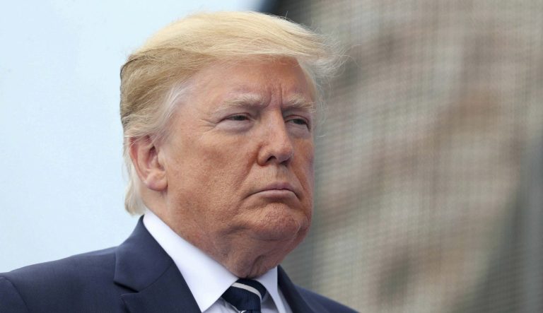 U.S President Donald Trump looks on during commemorations for the 75th Anniversary of the D-Day landings at Southsea Common, Portsmouth, England, Wednesday, June 5, 2019. 