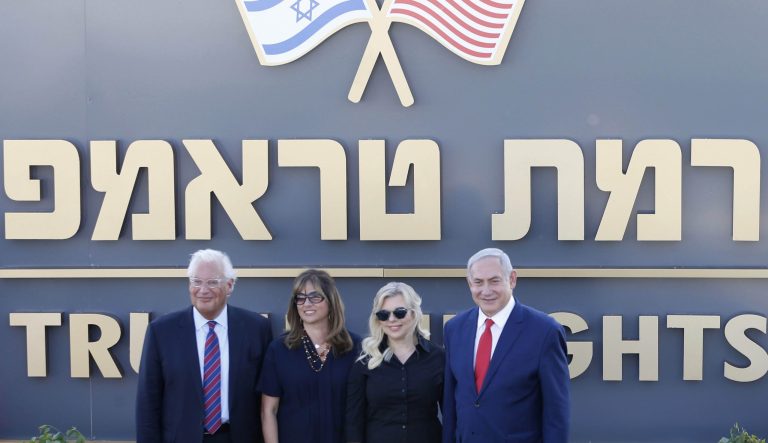 Israeli Prime Minister Benjamin Netanyahu, right, his wife Sara , United States Ambassador to Israel David Friedman, left, his wife Tammy pose during the inauguration of a new settlement named after President Donald Trump in the Golan Heights, Sunday, June 16, 2019. 
