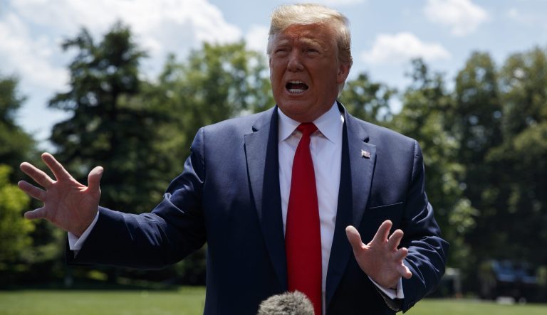 President Donald Trump talks with reporters on the South Lawn of the White House before departing to Japan for the G-20 summit, Wednesday, June 26, 2019, in Washington. 