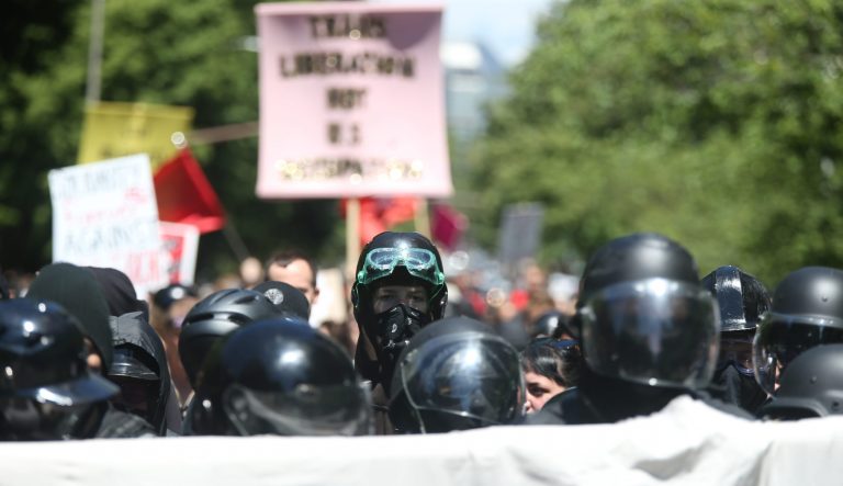 Multiple groups, including Rose City Antifa, the Proud Boys and conservative activist Haley Adams protest in downtown Portland, Ore., Saturday, June 29, 2019. 