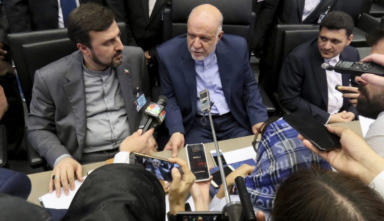 Iran's Minister of Petroleum Bijan Namdar Zangeneh, center, speaks prior to the start of a meeting of the Organization of the Petroleum Exporting Countries, OPEC, at their headquarters in Vienna, Austria, Monday, July 1, 2019. 