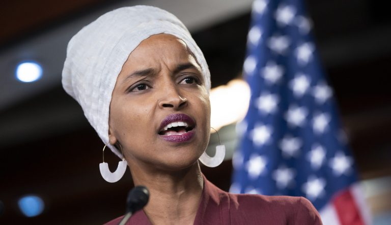 Rep. Ilhan Omar, D-Minn., respond to remarks by President Donald Trump after his call for the four Democratic congresswomen to go back to their "broken" countries, during a news conference at the Capitol in Washington, Monday, July 15, 2019.