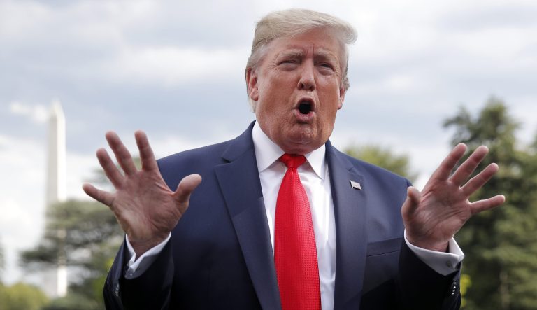 President Donald Trump speaks to members of the media at the White House in Washington, Wednesday, July 24, 2019, as he departs for a short trip to Andrews Air Force Base, Md., and onto Wheeling, W.Va., for a fundraiser. 