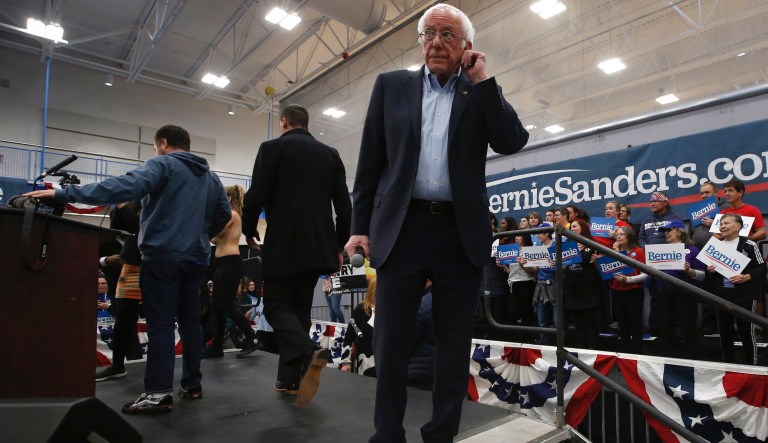 Topless protesters arrested after leaping on stage at Bernie Sanders Nevada rally