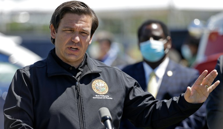 Gov. Ron DeSantis speaks during a news conference in Sarasota, Florida.