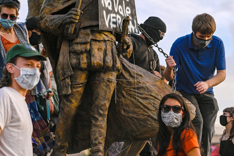 Protesters call 911 after New Mexico shooting