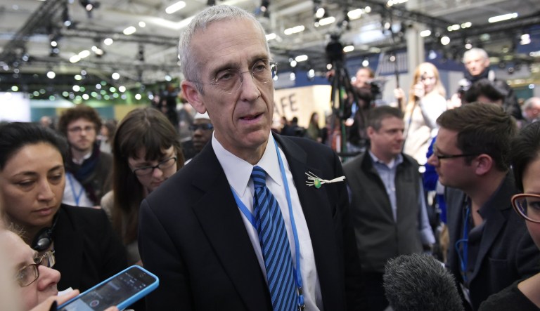 U.S Special Envoy for Climate Change Todd Stern is surrounded by reporters after the final draft of the climate pact was presented, during the COP 21 United Nations conference on climate change at Le Bourget, on the outskirts of Paris, Saturday, Dec. 12, 2015.