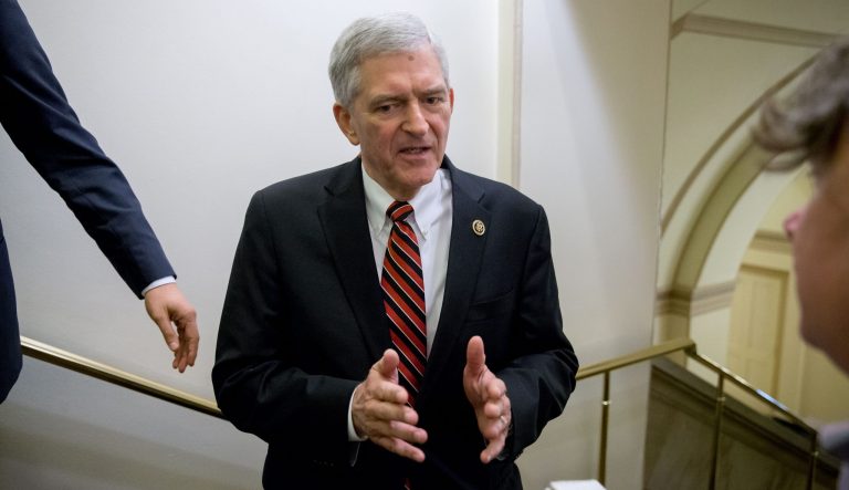 Rep. Daniel Webster, R-Fla. speaks to a reporter as he leaves a House Republican special leadership election meeting on Capitol Hill in Washington, Thursday, Oct. 8, 2015.