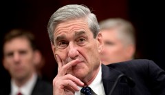 Justice Department releases redacted Mueller report — again