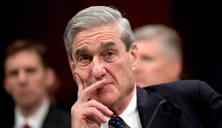 Then-FBI Director Robert Mueller listens on Capitol Hill in Washington during a hearing.