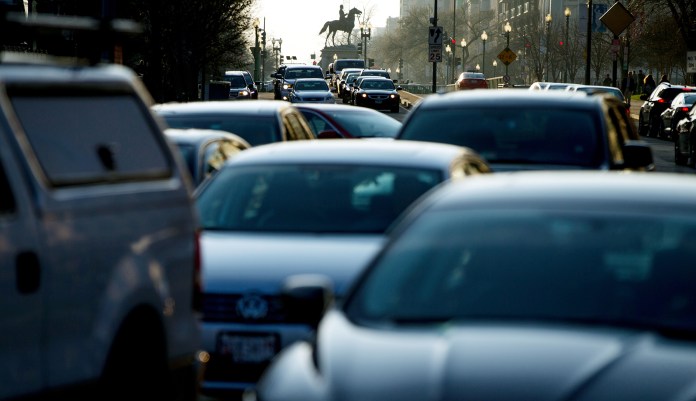 Morning traffic builds on Massachusetts Avenue, in Washington, Wednesday, March 16, 2016.