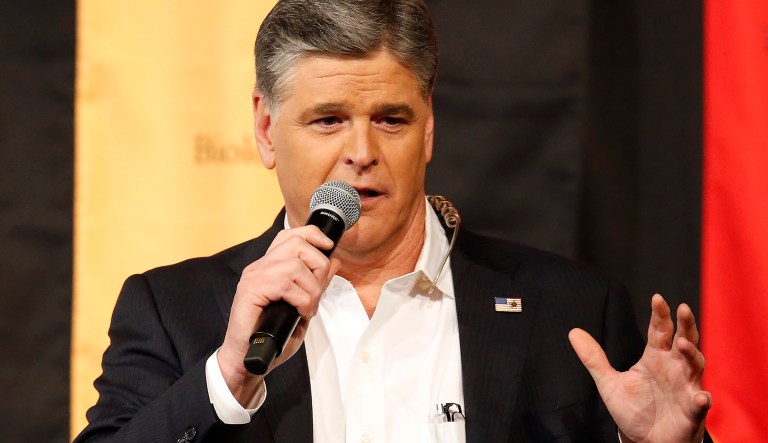 Fox News Channel's Sean Hannity speaks during a campaign rally for Republican presidential candidate, Sen. Ted Cruz, R-Texas, Friday, March 18, 2016, in Phoenix. 