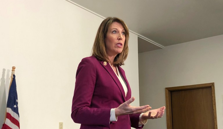 In this Saturday, Dec. 21, 2019, photo, Rep. Cindy Axne (D-IA) speaks to constituents about her vote on the USMCA trade deal in Guthrie Center, Iowa. 