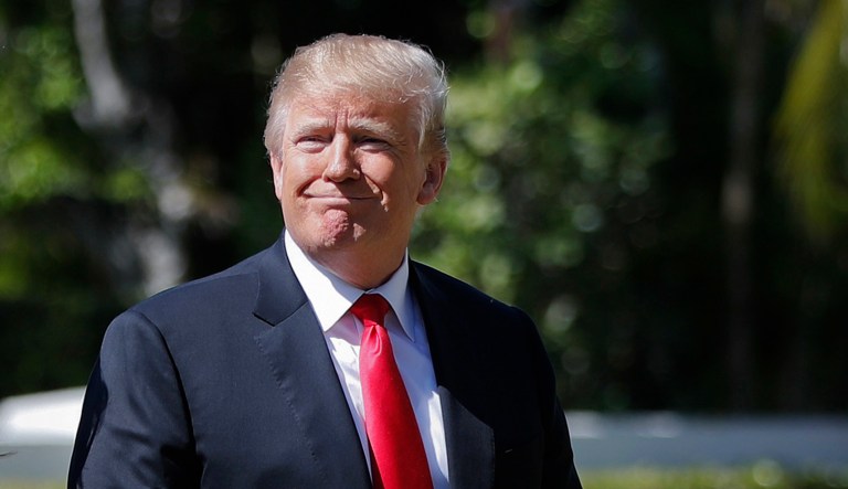 President Trump arrives for Easter services at Episcopal Church of Bethesda-by-the-Sea in Palm Beach, Fla.. 